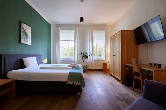 deluxe room | king bed on main building – ahead burghotel