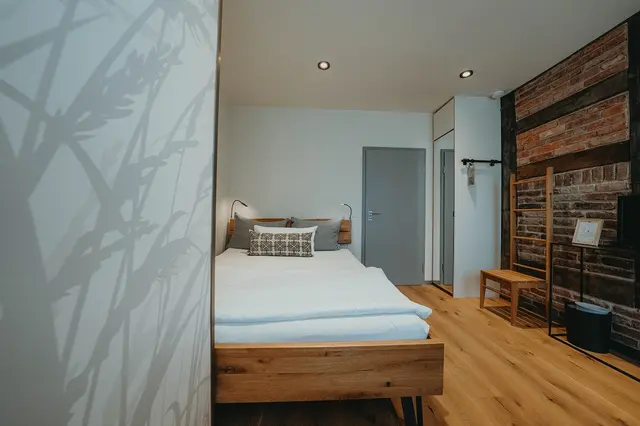 Double room with bed in niche — room at Biohotel WildLand, Wietze — photo 2 of 2