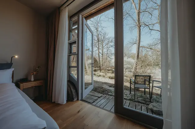 Historisches Doppelzimmer mit Terrasse — Biohotel WildLand, Wietze (2/4)