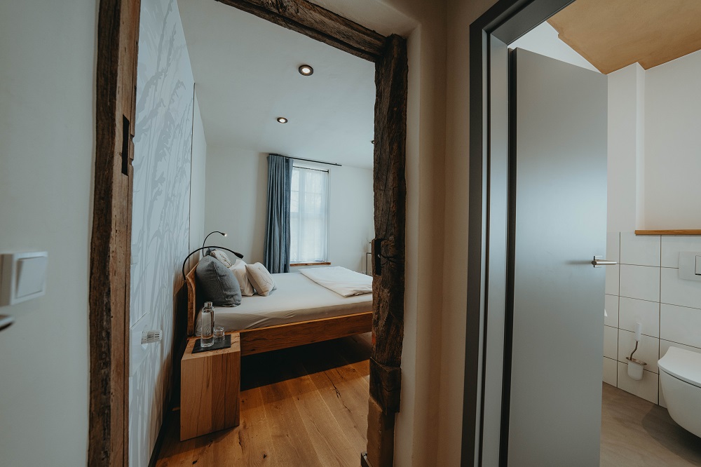 Historic double with tall windows — room at Biohotel WildLand, Wietze — photo 2 of 4