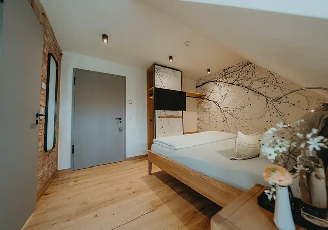 Queensize Double under the roof – Biohotel WildLand