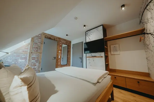 Queensize Double under the roof — Biohotel WildLand, Wietze (2/3)