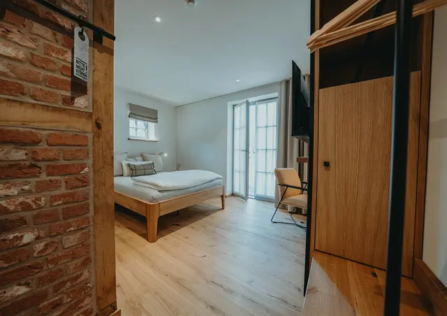 Queensize double with garden view – Biohotel WildLand