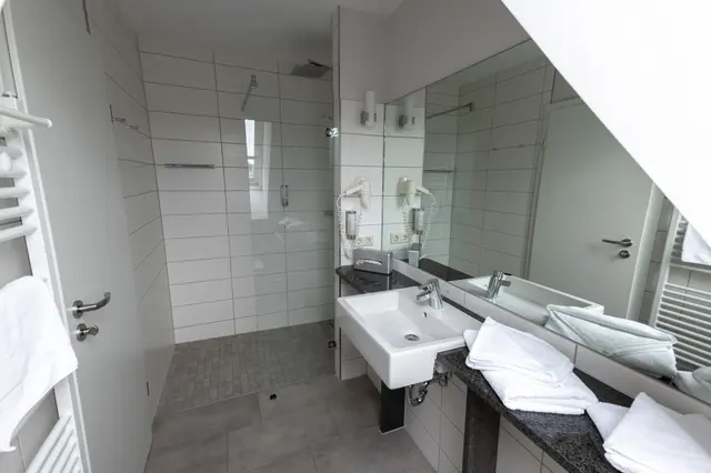 Family Suite | 2 Bedrooms with connecting door — room at Haffhus l Hotel & Spa, Seebad Ueckermünde — photo 2 of 3