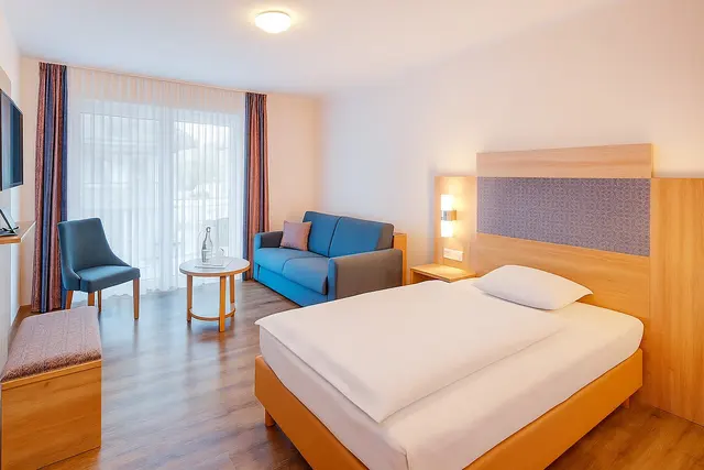 Single Bedroom Plus | Large double bed – Haffhus l Hotel & Spa