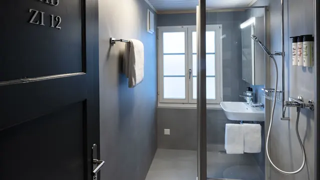 Double Room | Shared bathroom — room at Hotel Bergidyll - Riders Haven, Andermatt — photo 2 of 3