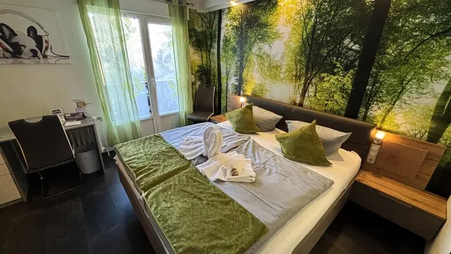 2 Double Rooms next to each other | with balcony and garden view — room at Hotel Paidion, Braunlage — photo 2 of 4