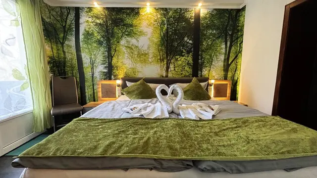 Double Room | Large bathroom and garden view — accommodation at Hotel Paidion, Braunlage — photo 2 of 6