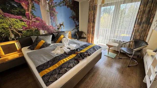 Family Room | Large balcony with garden view — Hotel Paidion, Braunlage (4/6)