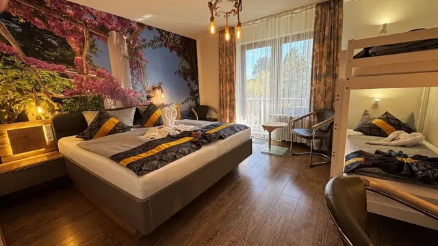 Family Room | Large balcony with garden view — Hotel Paidion, Braunlage (5/6)