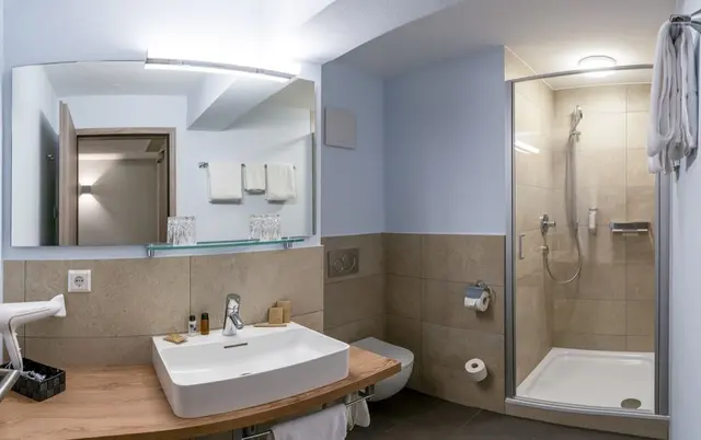 Deluxe | Double Bedroom & View to Cathedral — room at Hotel zum Rappen Freiburg, Freiburg — photo 2 of 6