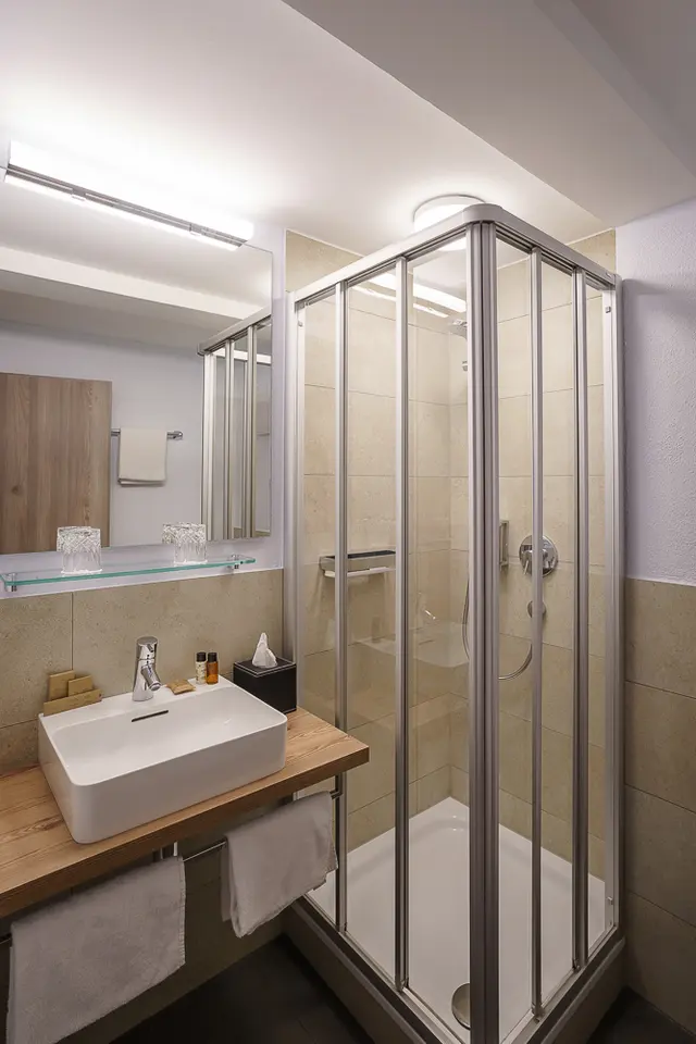 Small Deluxe | Double Bedroom & View to Cathedral — room at Hotel zum Rappen Freiburg, Freiburg — photo 4 of 6