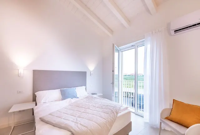 Suite Superiore | Sunny location close to the beach — apartment at Pareus Beach Resort Caorle, 30021 Caorle — photo 4 of 6