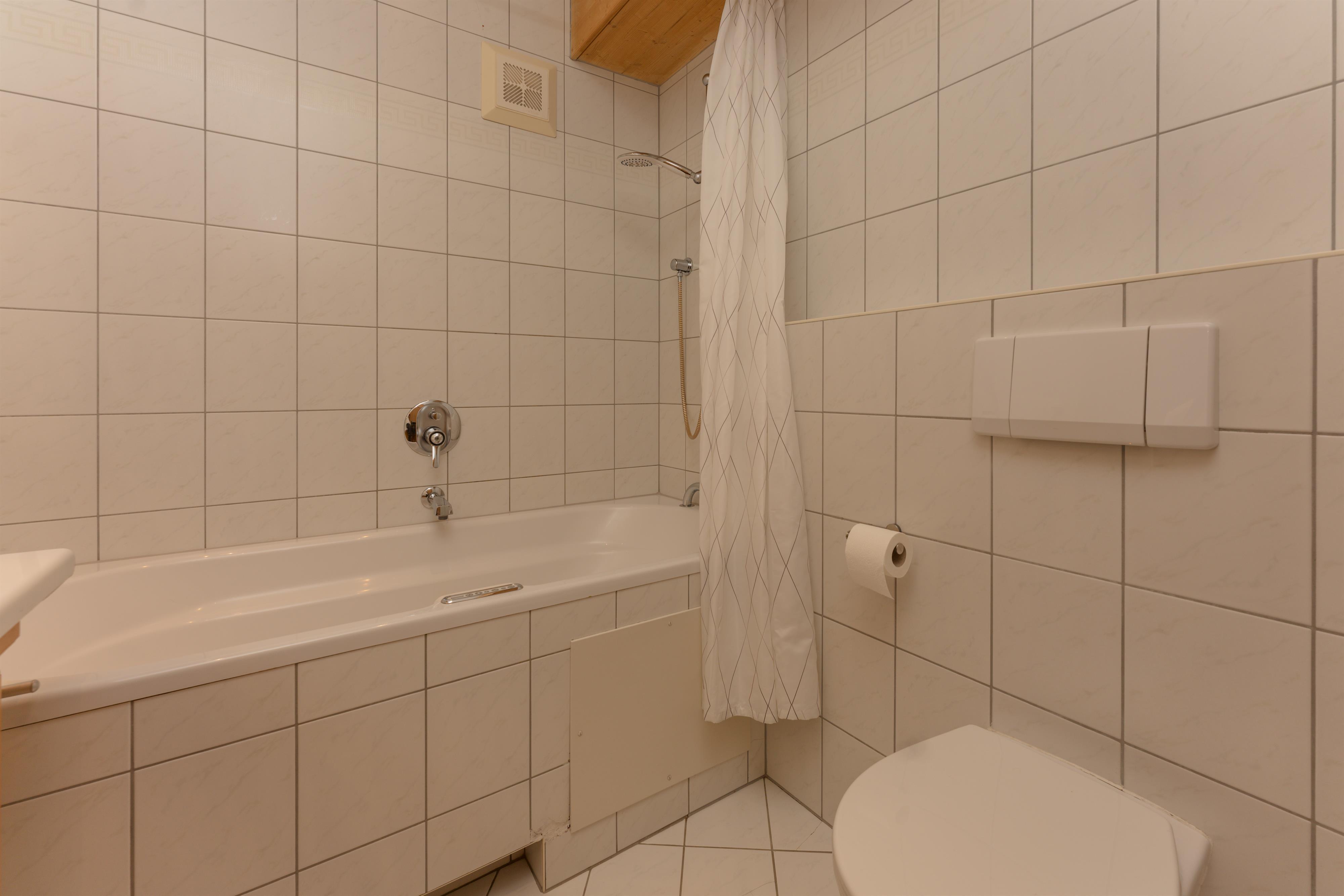 Berggasse XL | Refined retreat in a quiet prime location near Planai & the town center with west-facing terrace & Rohrmoos views — apartment at Schladming Appartements Maria Gruber GmbH, Schladming — photo 4 of 11