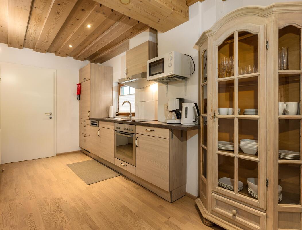Knappenhaus Silber | Cozy apartment with traditional tiled stove in a quiet central location — apartment at Schladming Appartements Maria Gruber GmbH, Schladming — photo 3 of 11