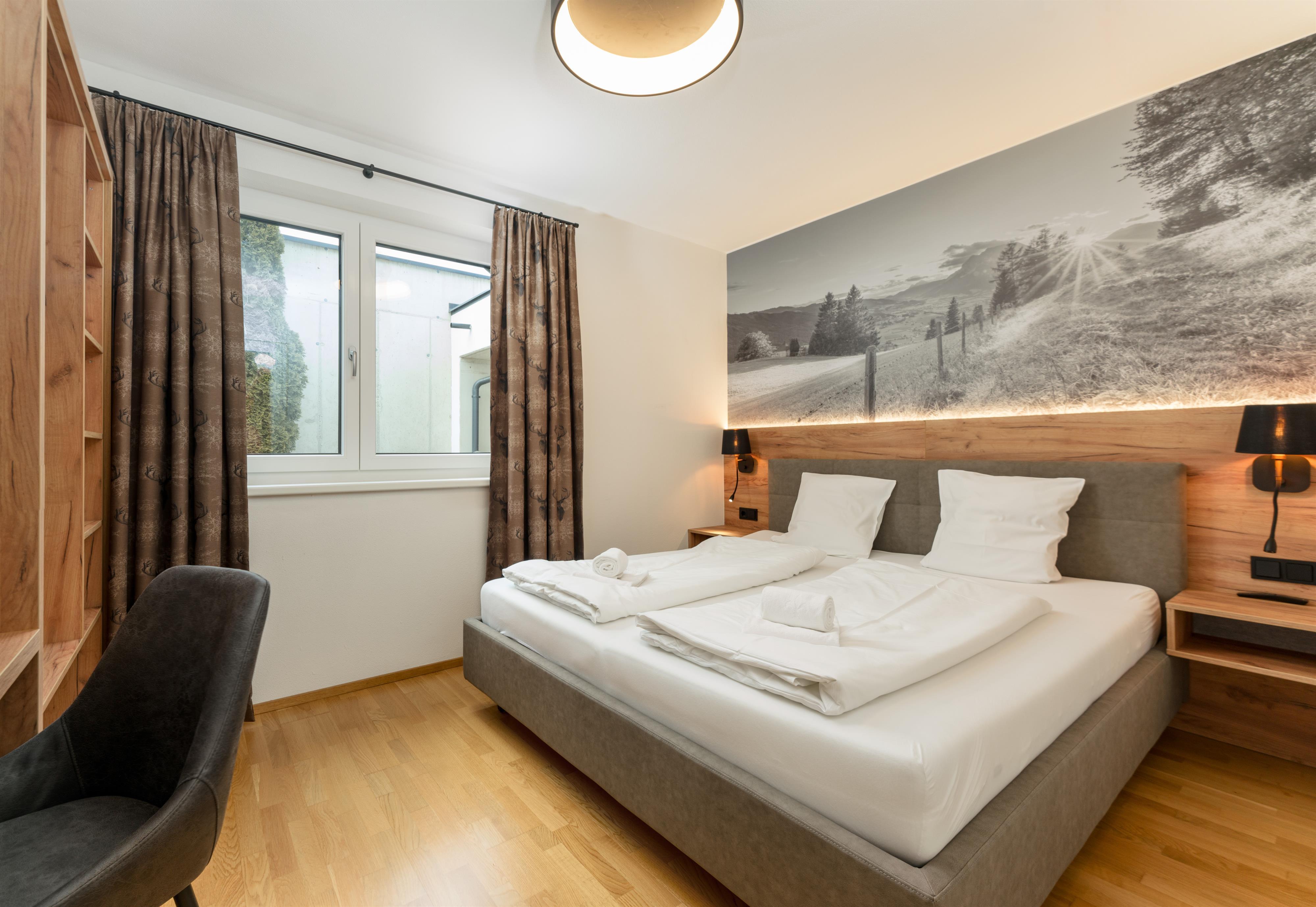 Sonnenhaus Garden Stoder | Modern retreat with private sauna, garden & mountain views — apartment at Schladming Appartements Maria Gruber GmbH, Schladming — photo 2 of 11