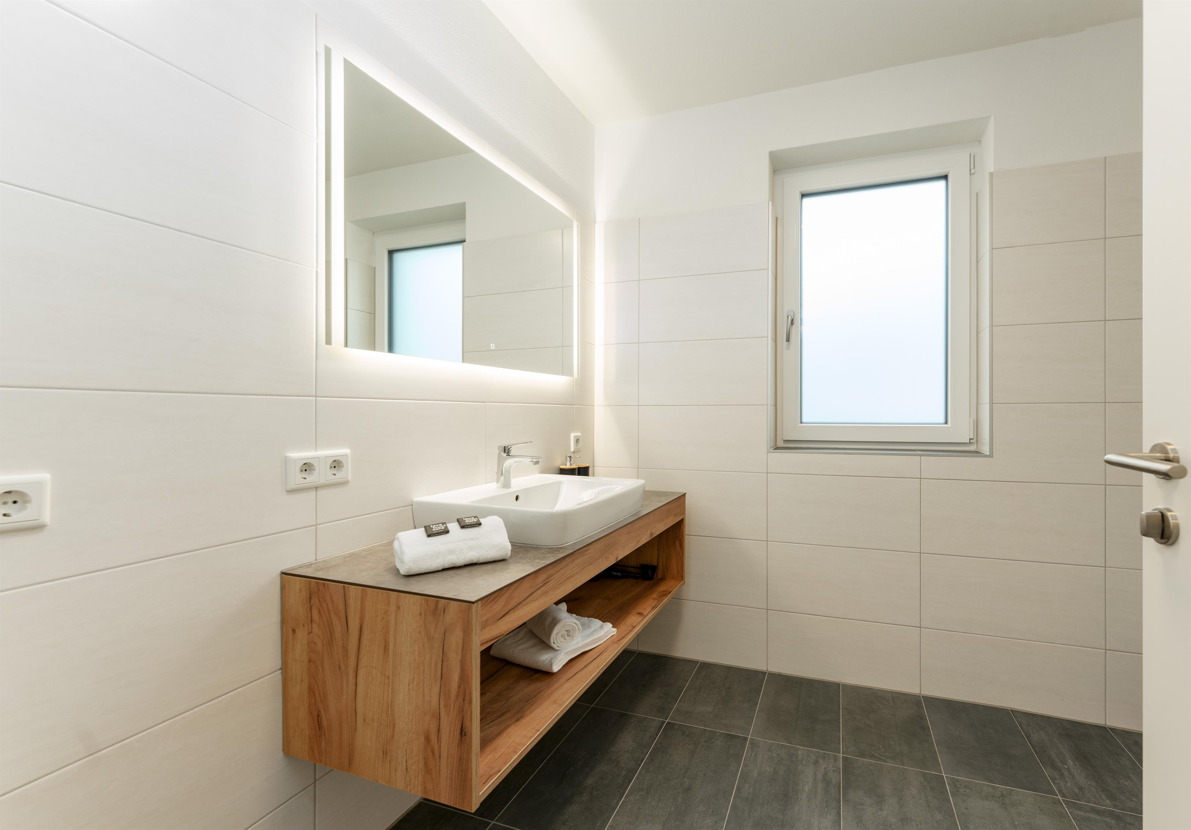 Sonnenhaus Garden Stoder | Modern retreat with private sauna, garden & mountain views — apartment at Schladming Appartements Maria Gruber GmbH, Schladming — photo 5 of 11