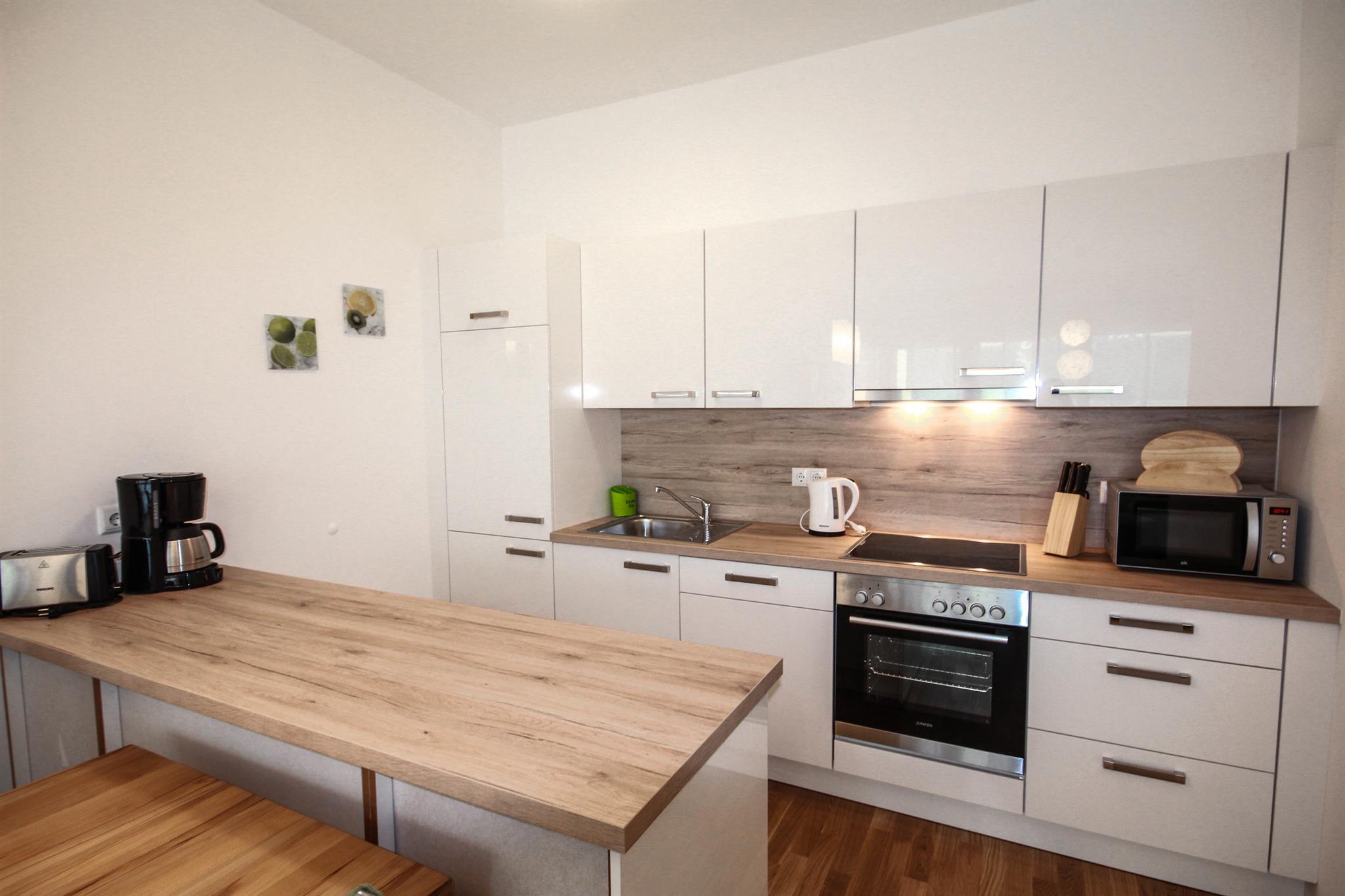 Stadtdomizil Top 2 Schladming Life | Comfortable garden apartment with west-facing terrace & everything on your doorstep — apartment at Schladming Appartements Maria Gruber GmbH, Schladming — photo 4 of 14