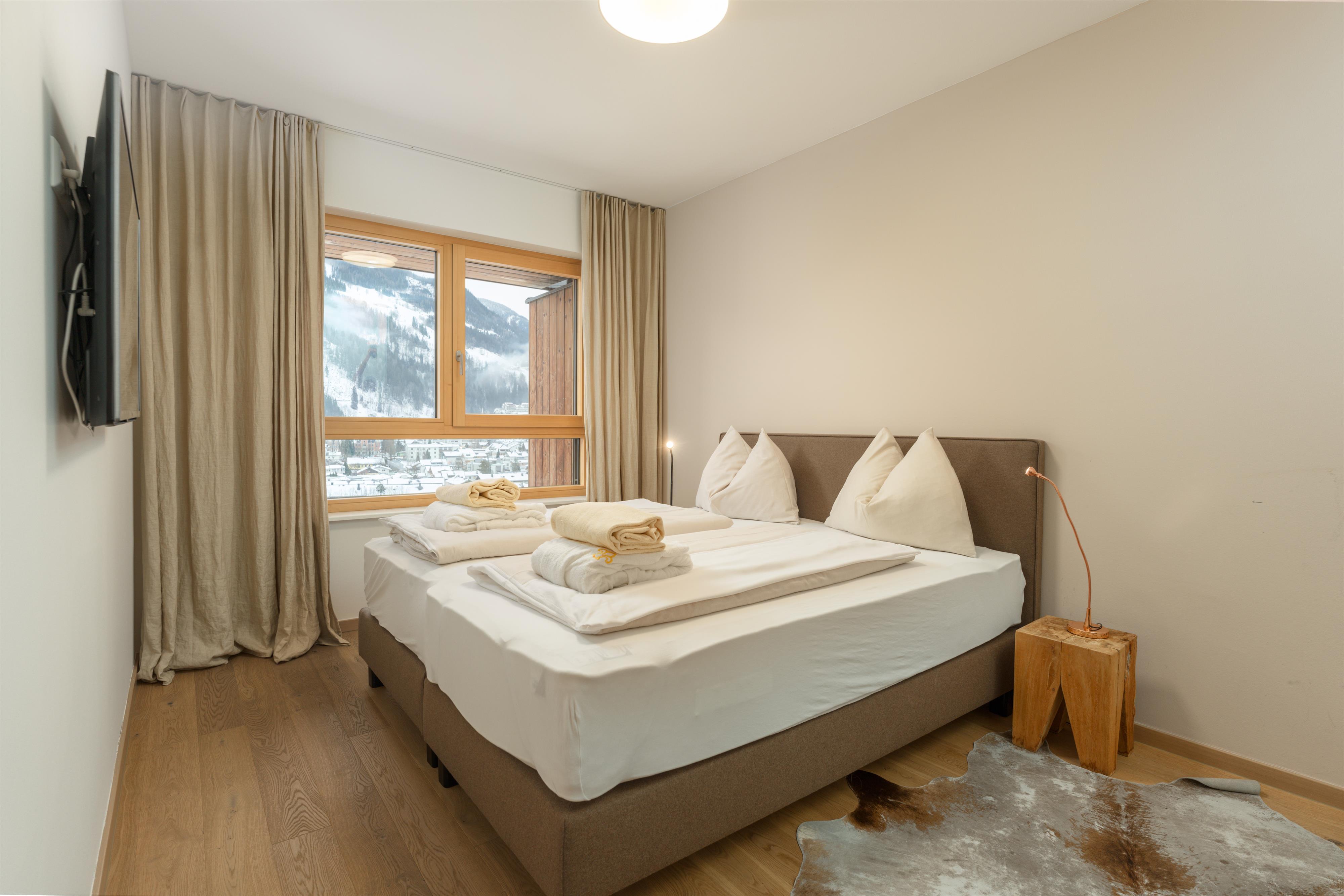 Sun Lodge | 1 bedroom panorama apartment with Loggia | twin bed | sofa bed | dog friendly | Indoor pool, garden, relax area, sauna & gym – Schladming Appartements Maria Gruber GmbH
