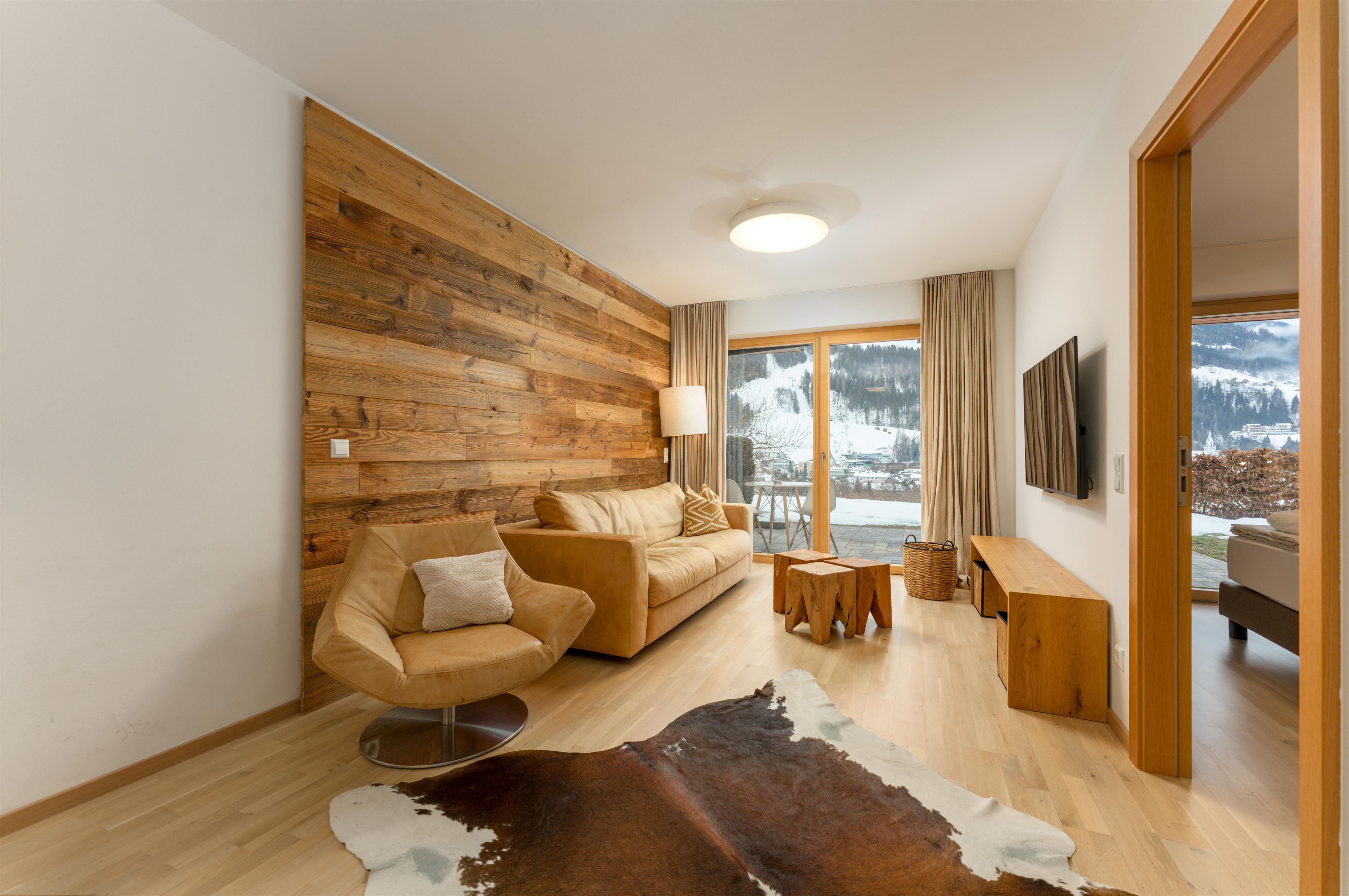 Sun Lodge | 1 bedroom panorama garden apartment with terrace | twin beds | sofa bed | near pool | microwave | dog friendly | Indoor pool, garden, relax area, sauna & gym — apartment at Schladming Appartements Maria Gruber GmbH, Schladming — photo 2 of 25
