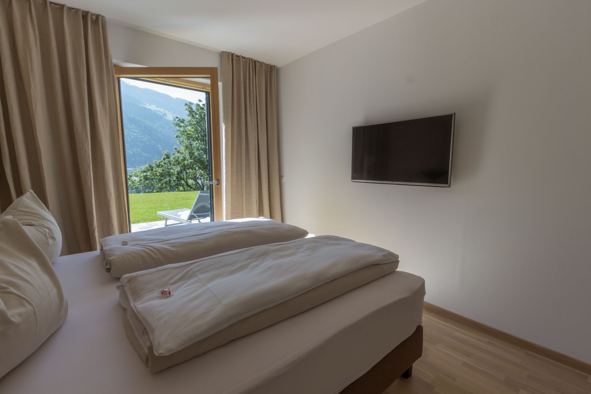 Sun Lodge | 2 bedroom panorama apartment with large terrace | twin beds | sofa bed | next to the pool | dog friendly | Indoor pool, garden, relax area, sauna & gym — apartment at Schladming Appartements Maria Gruber GmbH, Schladming — photo 8 of 27