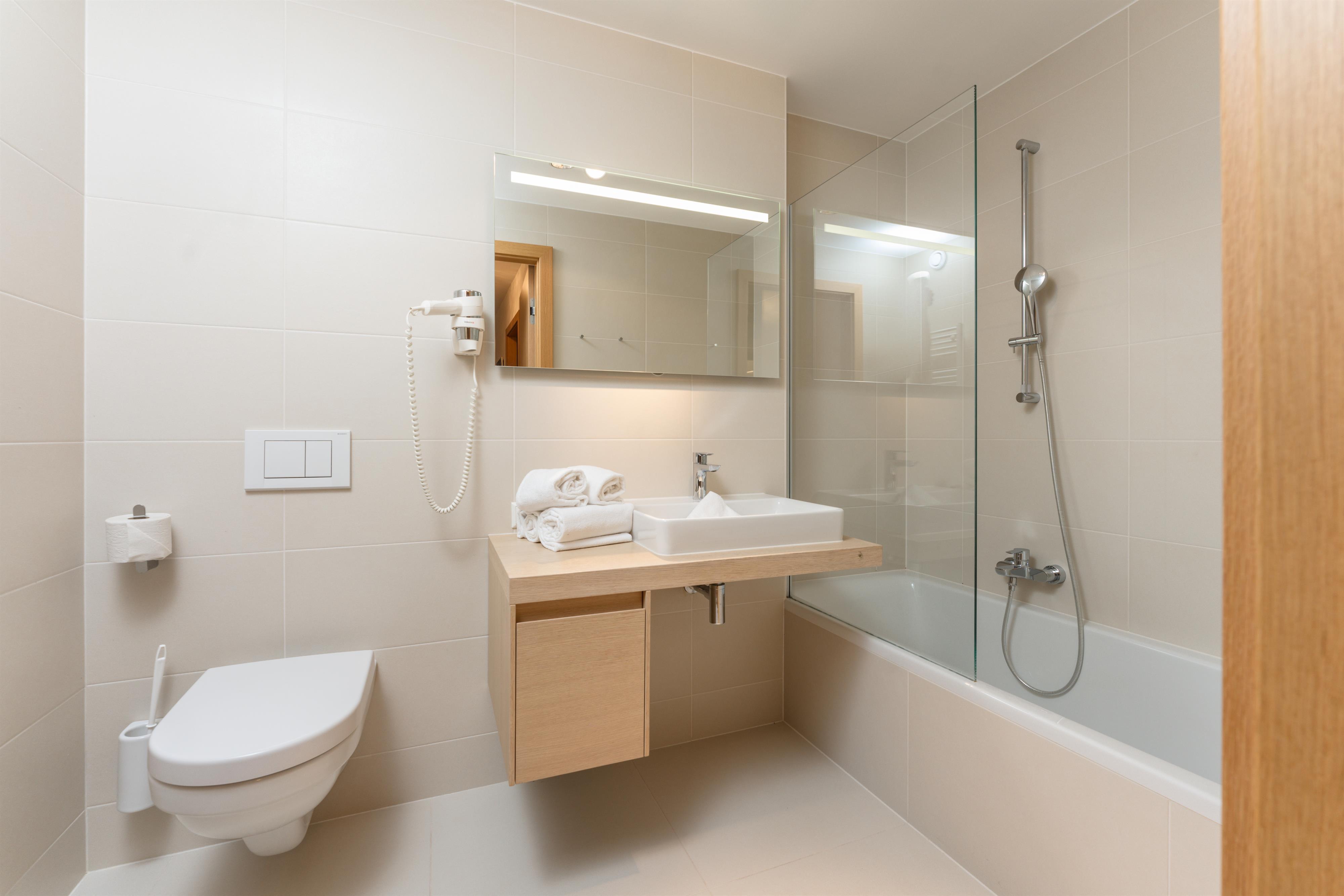 Sun Lodge | 2 bedroom panorama apartment with Loggia | twin beds | sofa bed | microwave | private washing machine | dog friendly | Indoor pool, garden, relax area, sauna & gym — apartment at Schladming Appartements Maria Gruber GmbH, Schladming — photo 7 of 23