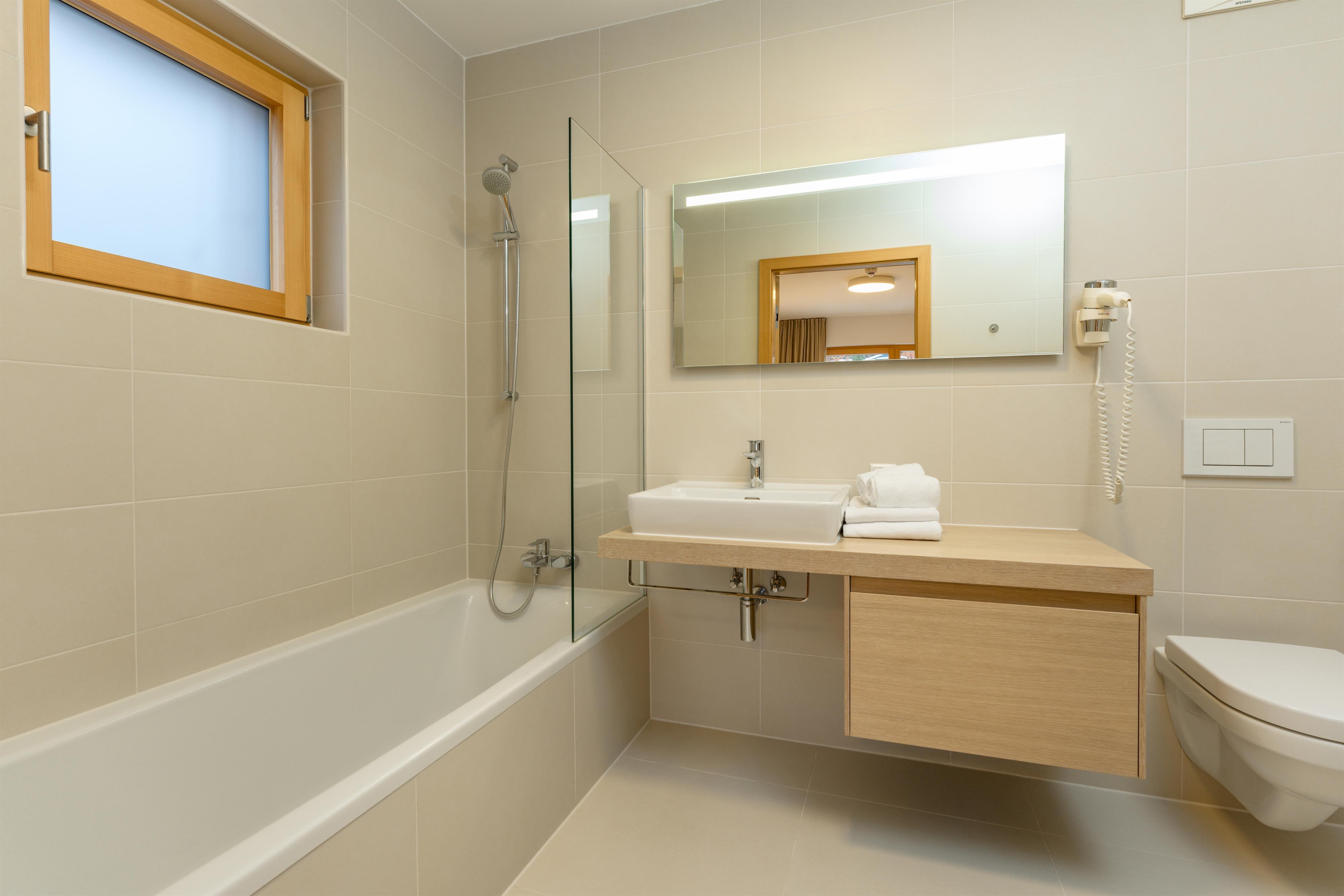 Sun Lodge | 2 bedroom panorama apartment with Loggia | sunset view | twin beds | sofa bed | dog friendly | Indoor pool, garden, relax area, sauna & gym — apartment at Schladming Appartements Maria Gruber GmbH, Schladming — photo 12 of 24