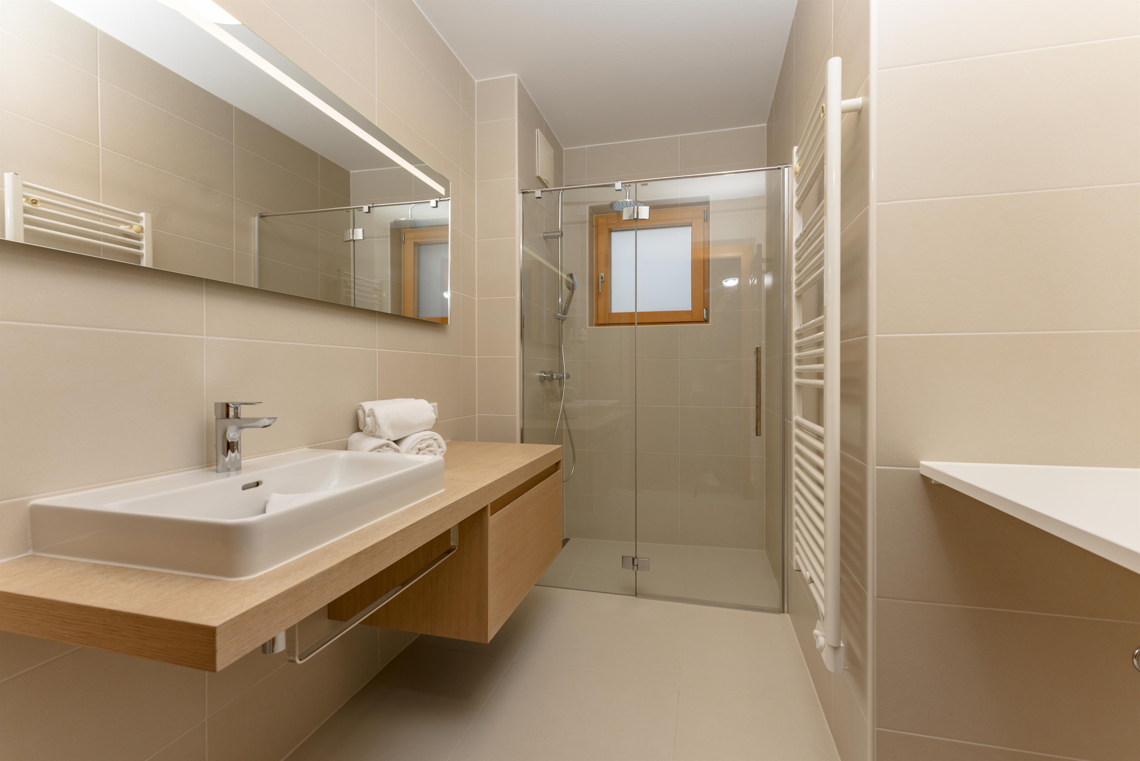 Sun Lodge | 2 bedroom panorama apartment with large corner Loggia | twin beds | sofa bed | Indoor pool, garden, relax area, sauna & gym — apartment at Schladming Appartements Maria Gruber GmbH, Schladming — photo 11 of 25
