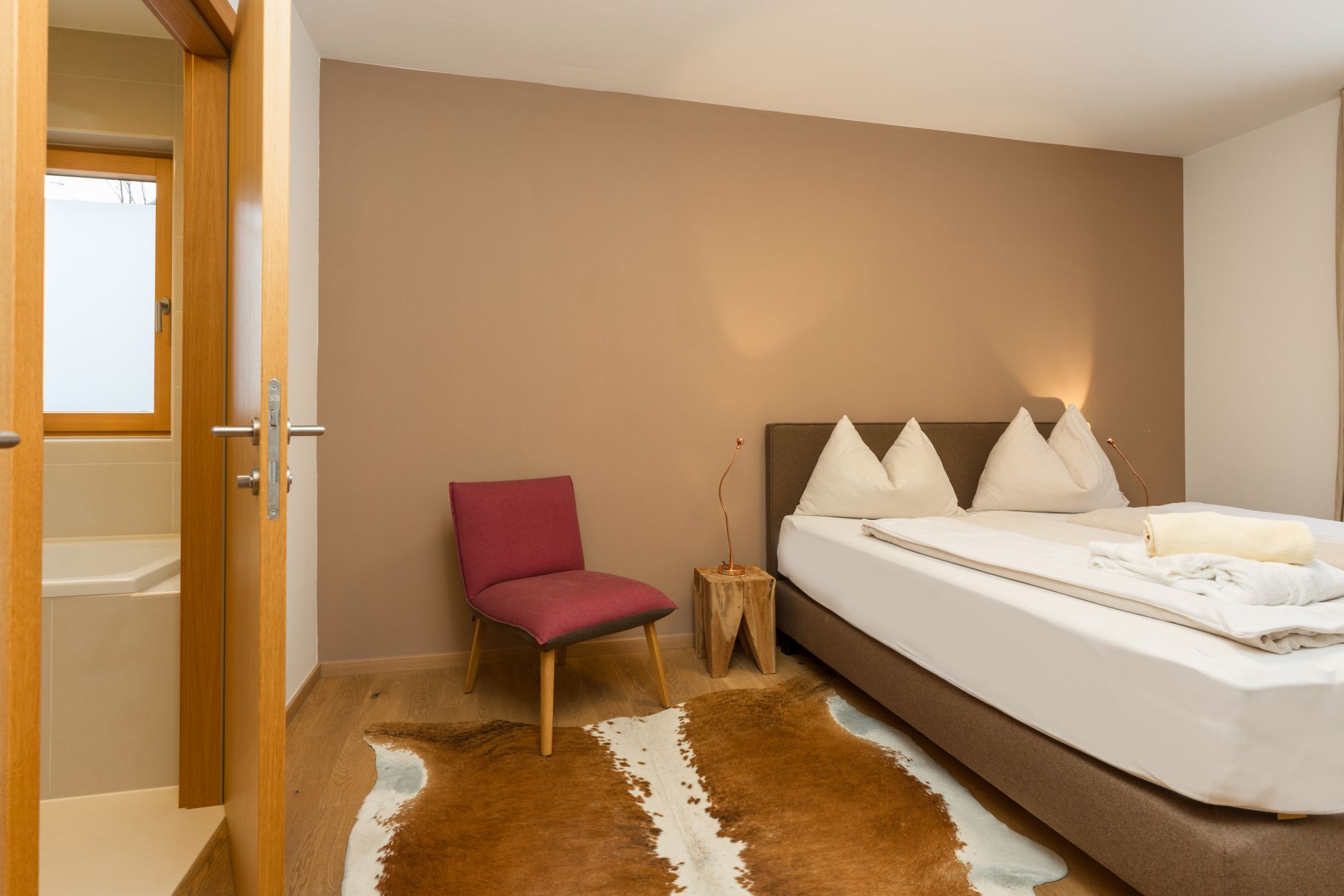 Sun Lodge | 2 bedroom panorama apartment with large corner Loggia | twin beds | sofa bed | Indoor pool, garden, relax area, sauna & gym — apartment at Schladming Appartements Maria Gruber GmbH, Schladming — photo 9 of 25