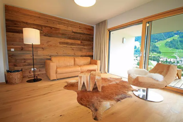 Sun Lodge | 2 bedroom panorama apartment with large corner Loggia | sunset view | twin beds | sofa bed | higher floor | dog friendly | Indoor pool, garden, relax area, sauna & gym — apartment at Schladming Appartements Maria Gruber GmbH, Schladming — photo 3 of 30