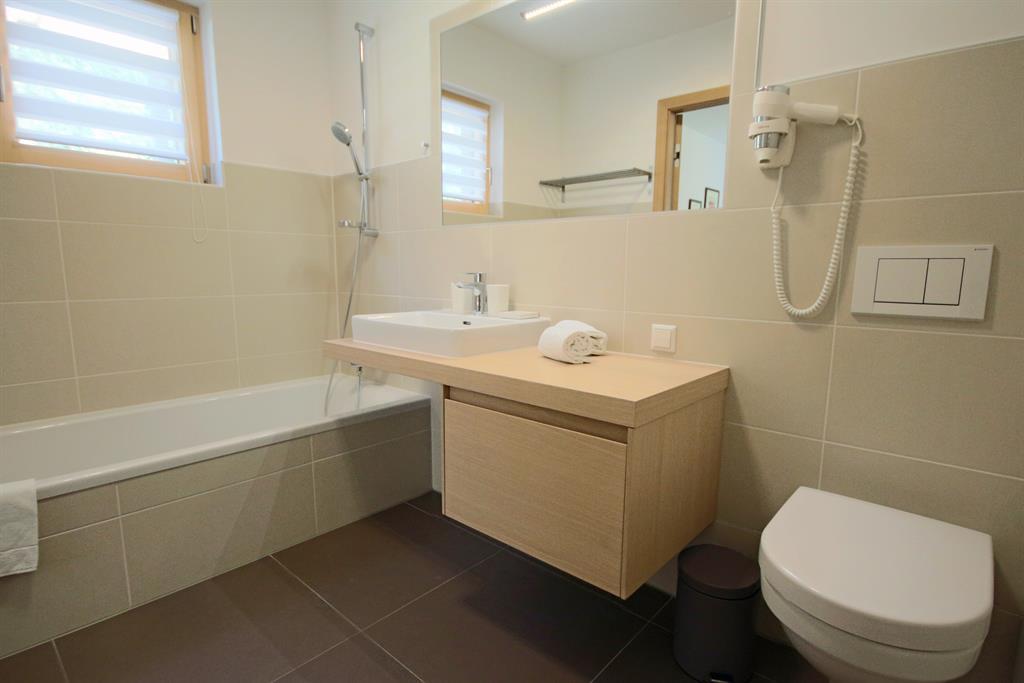 Sun Lodge | 2 bedroom panorma apartment with large corner Loggia | sofa bed | dog friendly | Indoor pool, garden, relax area, sauna & gym — apartment at Schladming Appartements Maria Gruber GmbH, Schladming — photo 16 of 29