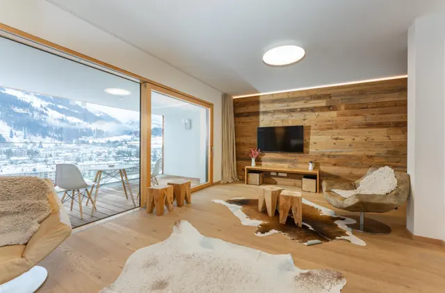Sun Lodge | XL 3 bedroom panorma apartment with 2 Loggia South and East | twin beds | sofa bed | higher floor | Indoor pool, garden, relax area, sauna & gym — apartment at Schladming Appartements Maria Gruber GmbH, Schladming — photo 3 of 32
