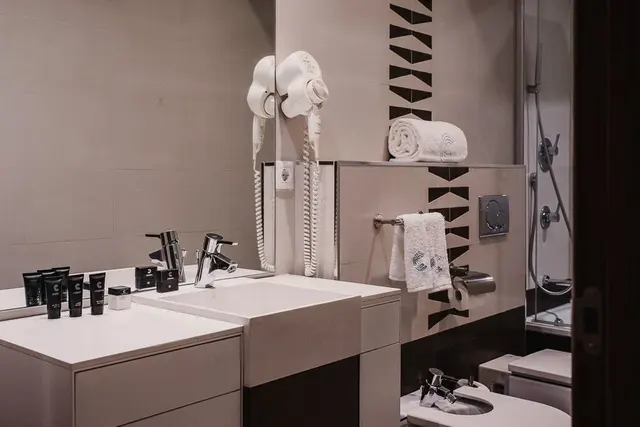 Away from elevator | Kitchen and Living Room — apartment at Signa Juristas, Valencia — photo 2 of 5