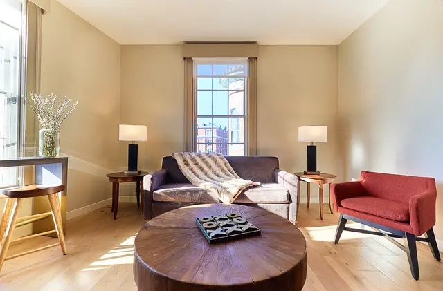 One Bedroom Corner Loft – The Docents Collection